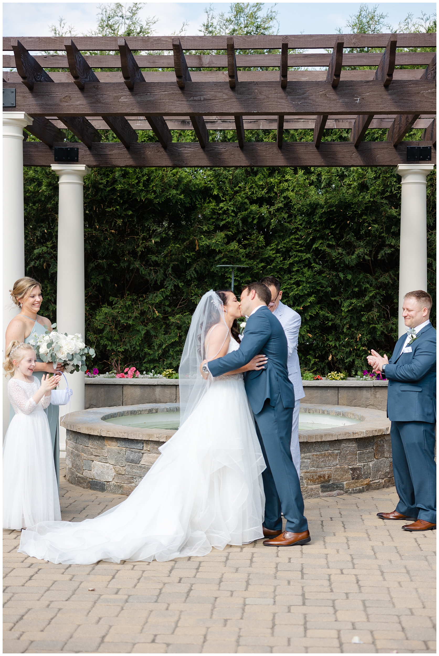 Spring wedding at birchwood vineyards first kiss